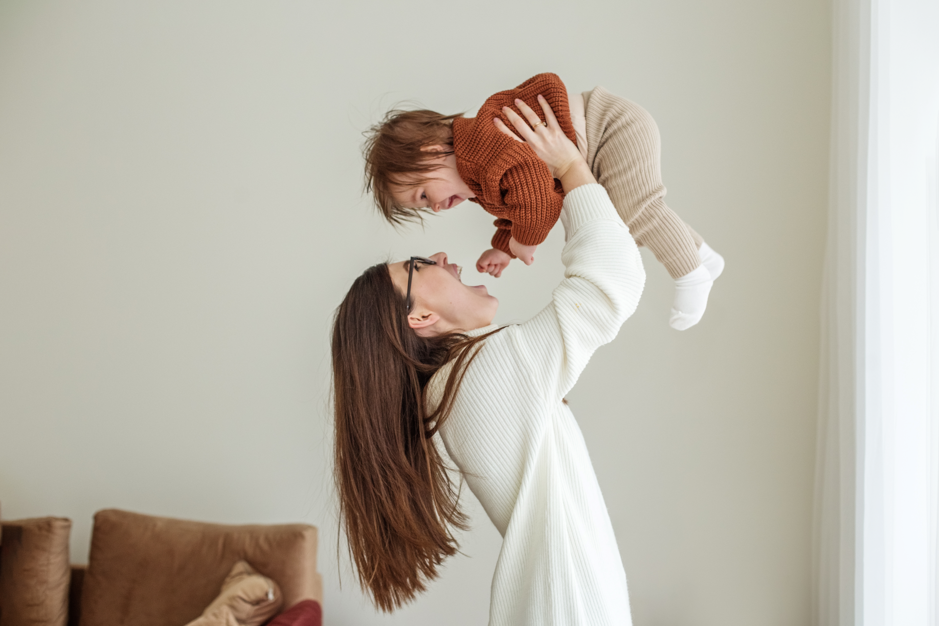 Atworth Child Care You can Trust, women holding baby in her arms.