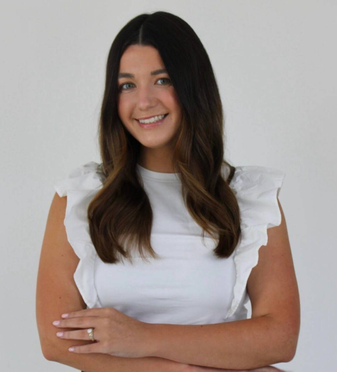 Natalie Ashcraft, Talent Coordinator at Atworth, smiling in a professional headshot against a neutral background.