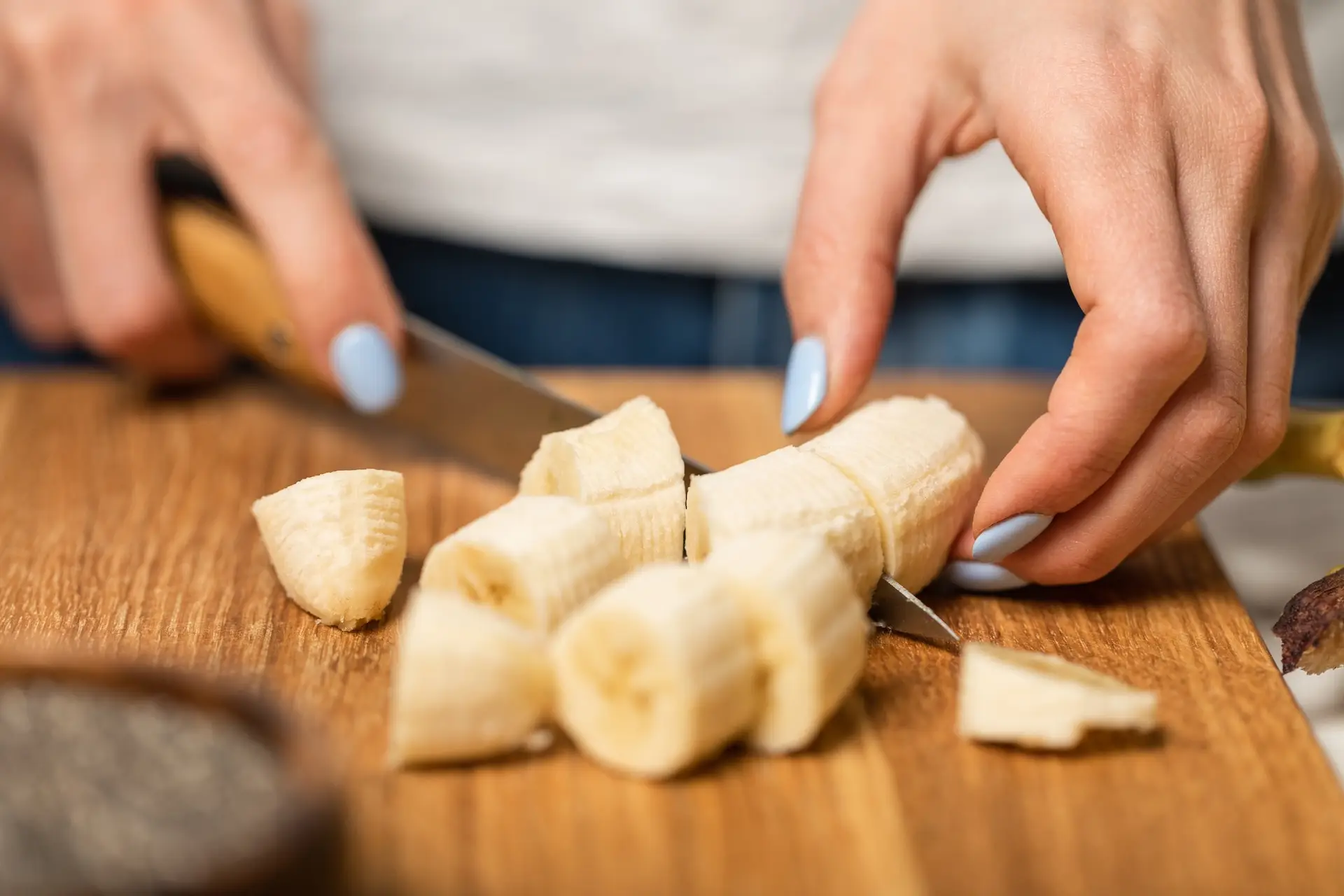 family assistant meal prepping banana's
